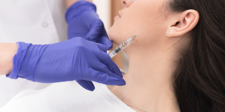 A nurse injects botox into a woman's face: how to become an aesthetic nurse