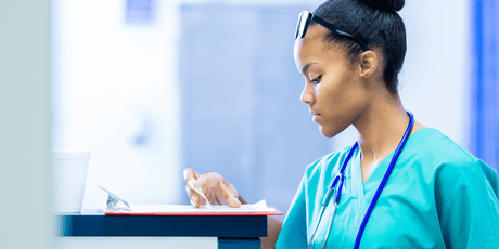 Young African American Black female nurse learning the 5 ps of nursing