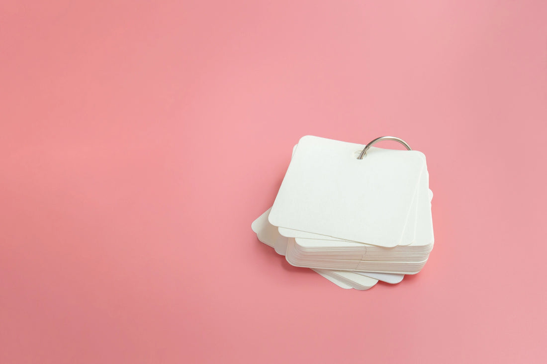 Flashcards on a pink background