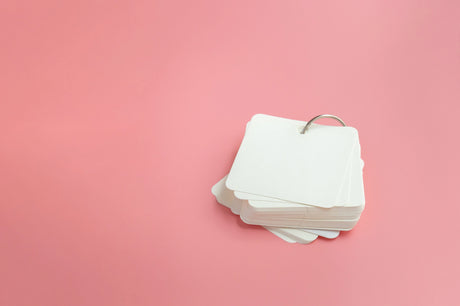 Flashcards on a pink background