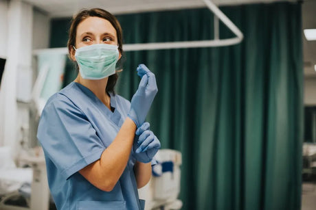 Med Surg Nurse Preparing for an Exam with Latex Gloves