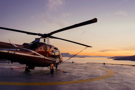 Medical Helicopter with flight nurse inside on a helipad