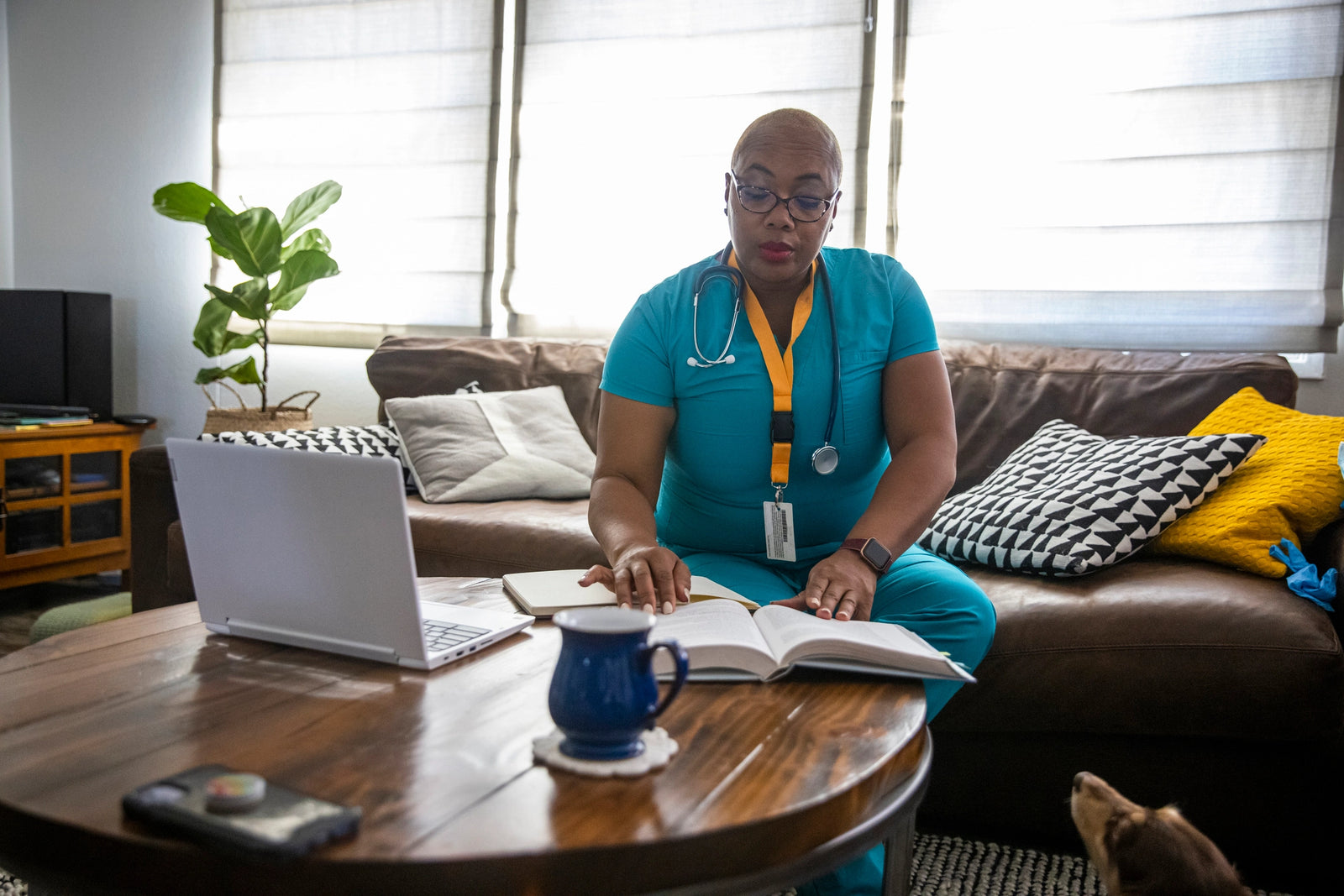 Nurse studying on Couch
