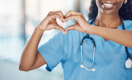 Nursing hands and wrists forming a heart
