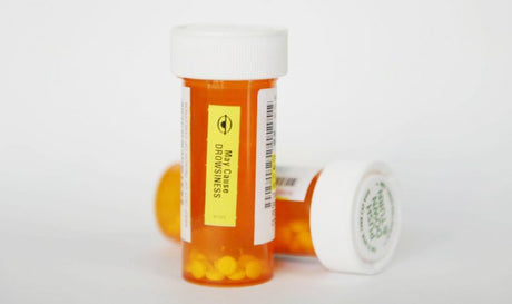 Opioid therapy medicine child proof medicine bottles.