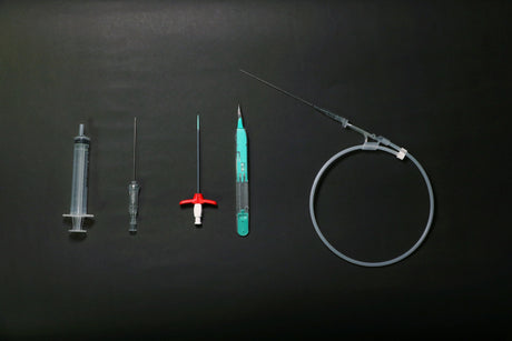 Picc Line Materials Laid On Black Background