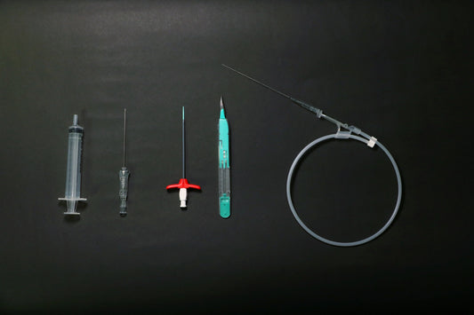 Picc Line Materials Laid On Black Background