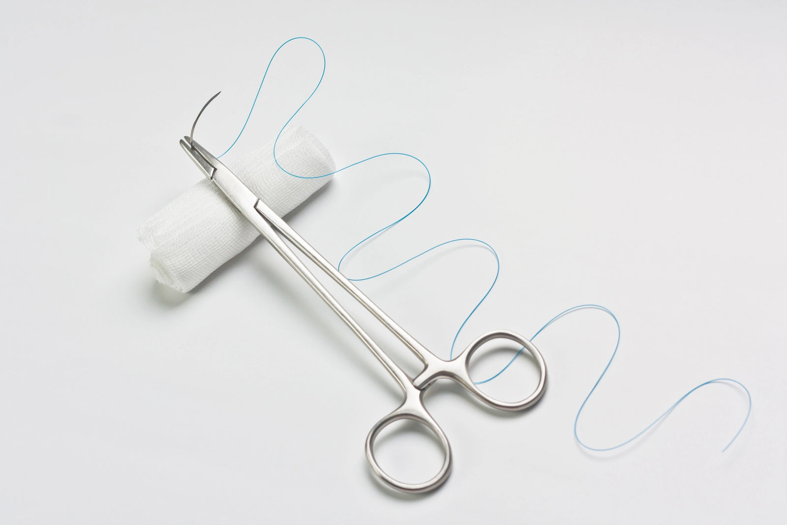 Suture Materials on a White Background