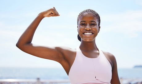 Woman flexing with biceps brachii