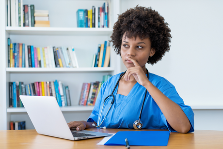 Young African American Black woman potential nursing student asking should i become a nurse