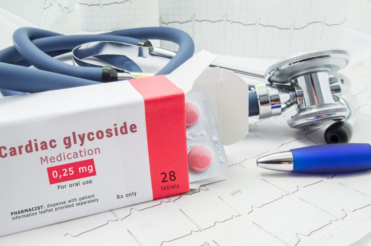 Cardiac glycoside drug for treatment pathologies of heart and blood vessels. Packing of pills with inscription "Cardiac glycoside Medication" for treatment cardiovascular diseases, heart failure