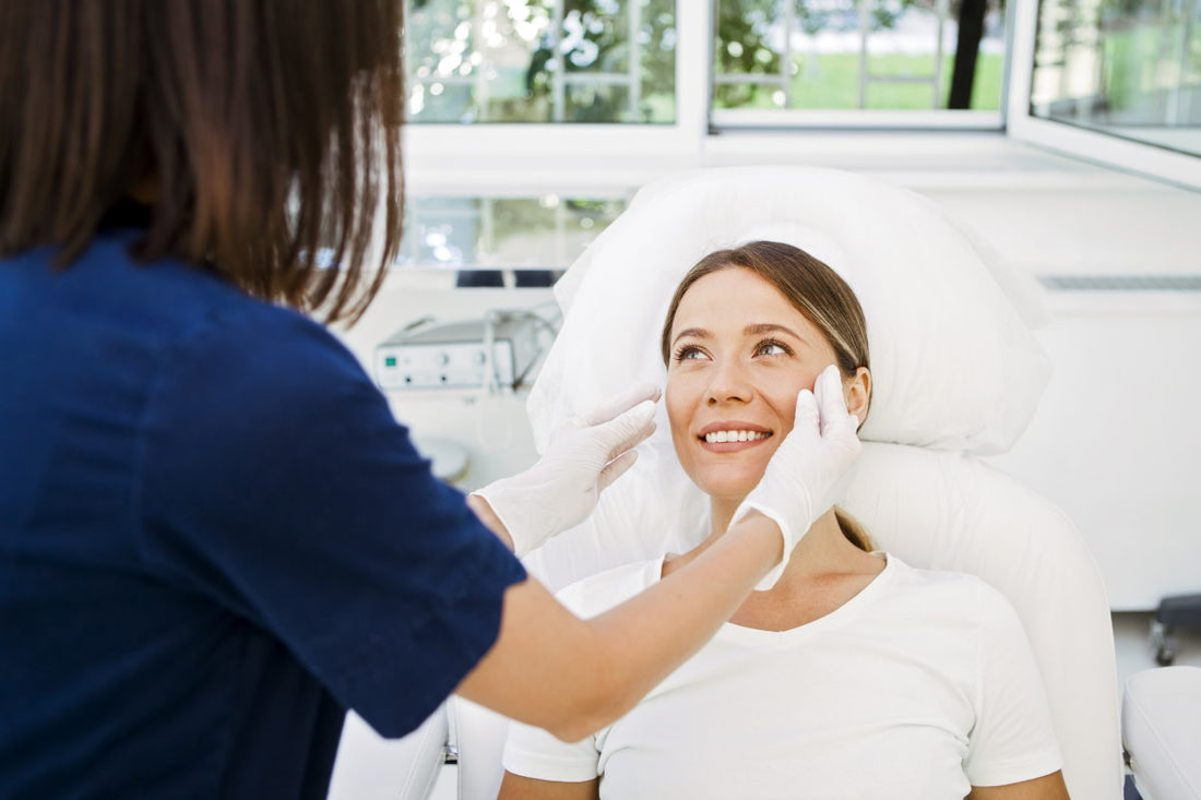 Nurse assessing for Chvostek’s sign in a young woman patient.