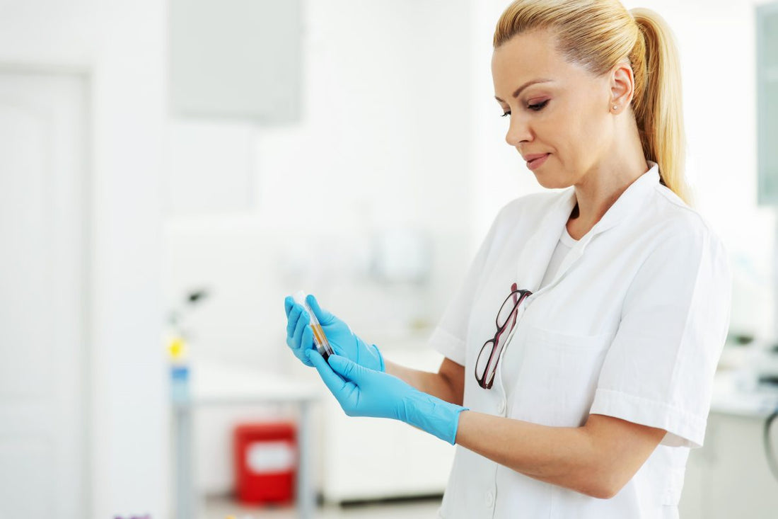 Blonde female nurse finding out what does MCV and MPV mean in a blood test