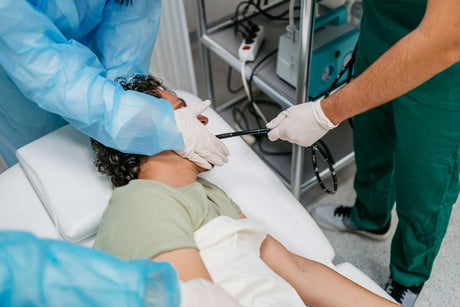 Team of doctors and nurses performing gastroscopy - esophageal varices title card