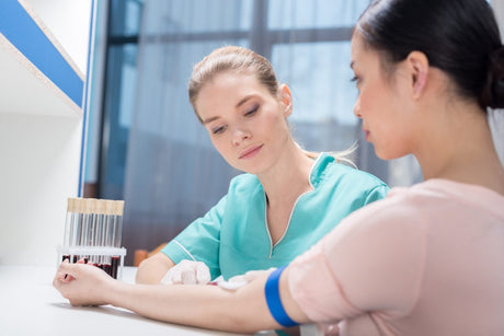 nurse taking blood test using ABG method