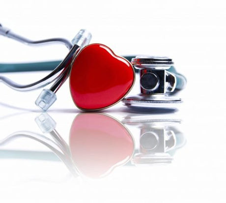 Enamel red heart and a stethoscope